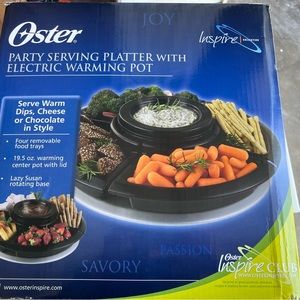Oster serving platter with center warming pot with lid. Free ship. Weight 10 lbs